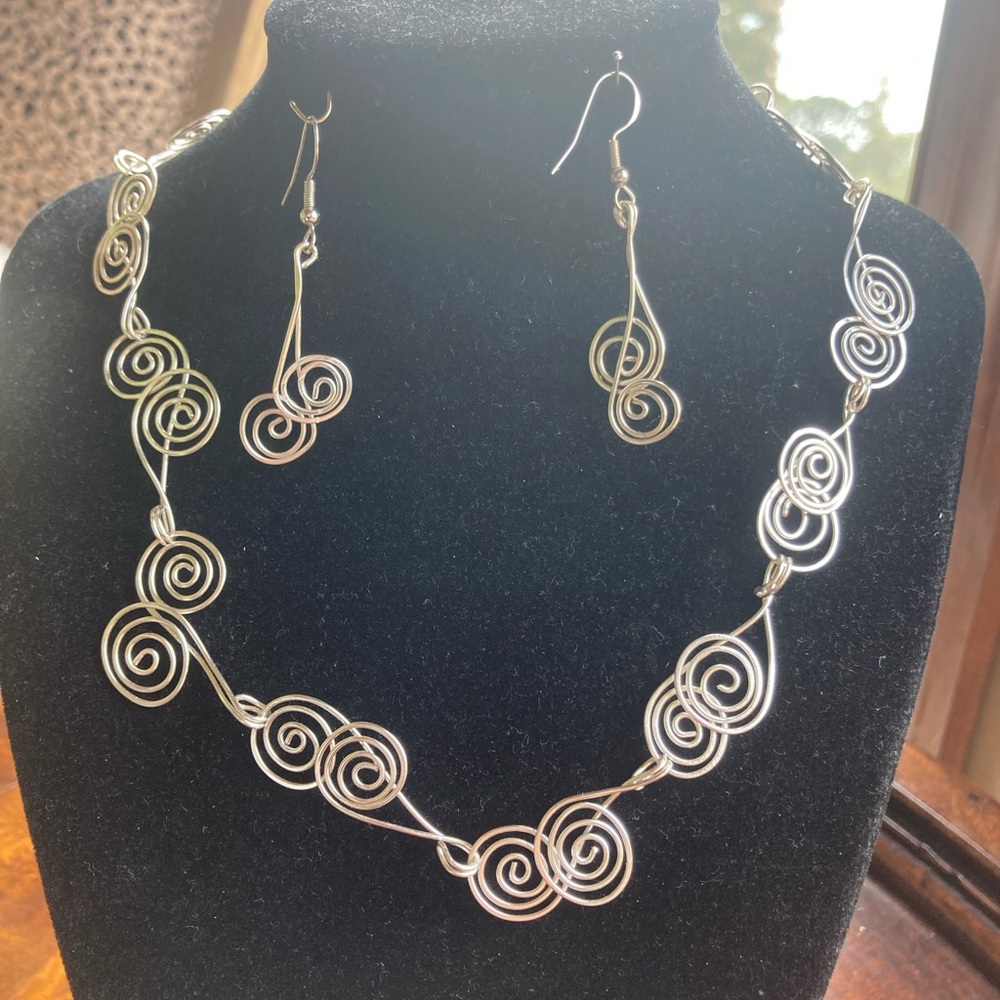 Silver swirls